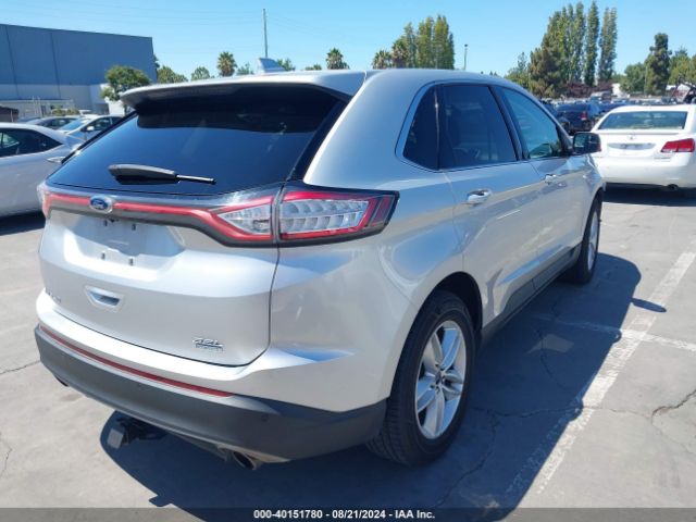 Photo 3 VIN: 2FMPK3J98GBB89007 - FORD EDGE 