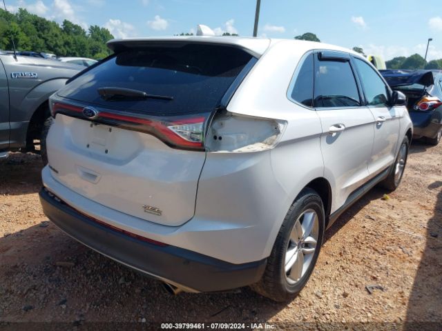 Photo 3 VIN: 2FMPK3J98GBC56141 - FORD EDGE 