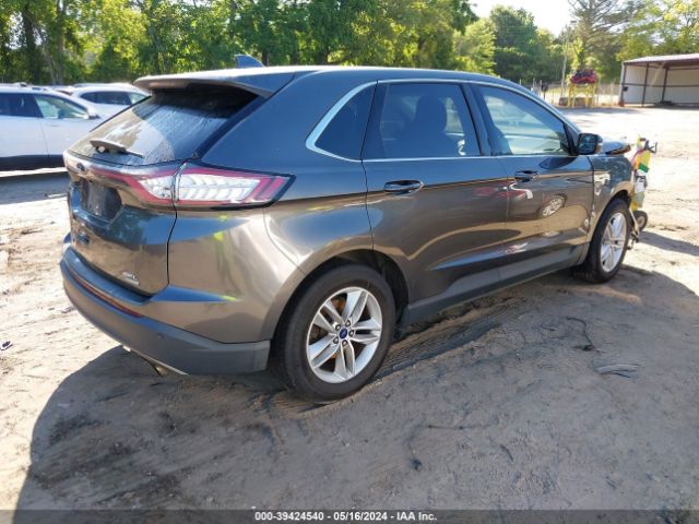 Photo 3 VIN: 2FMPK3J98JBB02701 - FORD EDGE 