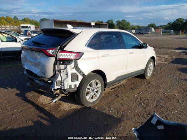 Photo 3 VIN: 2FMPK4J80JBB48178 - FORD EDGE 