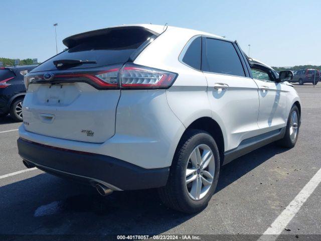 Photo 3 VIN: 2FMPK4J81JBB11463 - FORD EDGE 