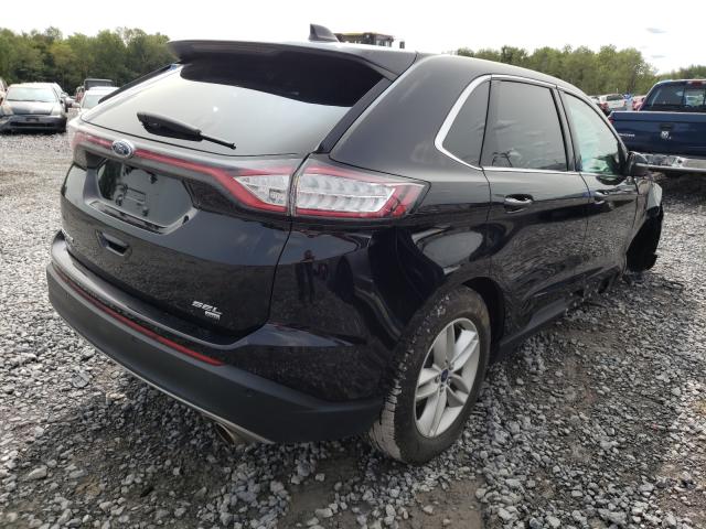 Photo 3 VIN: 2FMPK4J85GBB00779 - FORD EDGE SEL 