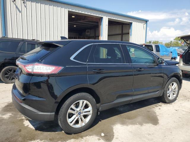 Photo 2 VIN: 2FMPK4J89JBB27703 - FORD EDGE SEL 