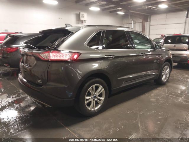 Photo 3 VIN: 2FMPK4J90GBB88620 - FORD EDGE 