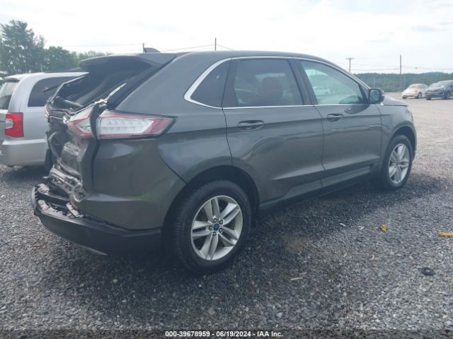 Photo 3 VIN: 2FMPK4J90JBC02703 - FORD EDGE 