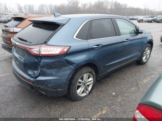 Photo 3 VIN: 2FMPK4J91JBB12718 - FORD EDGE 