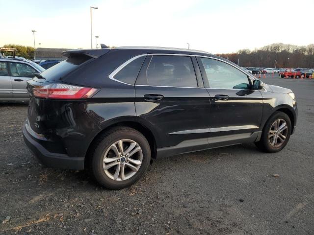 Photo 2 VIN: 2FMPK4J98KBB86509 - FORD EDGE SEL 