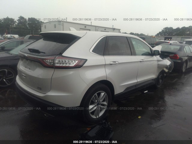 Photo 3 VIN: 2FMPK4J99JBB30500 - FORD EDGE 