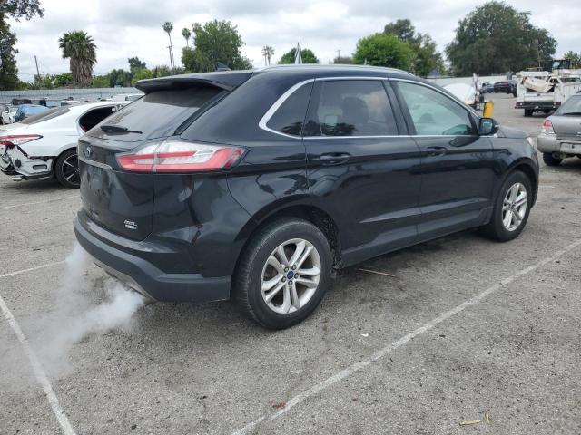 Photo 2 VIN: 2FMPK4J9XKBC60285 - FORD EDGE 