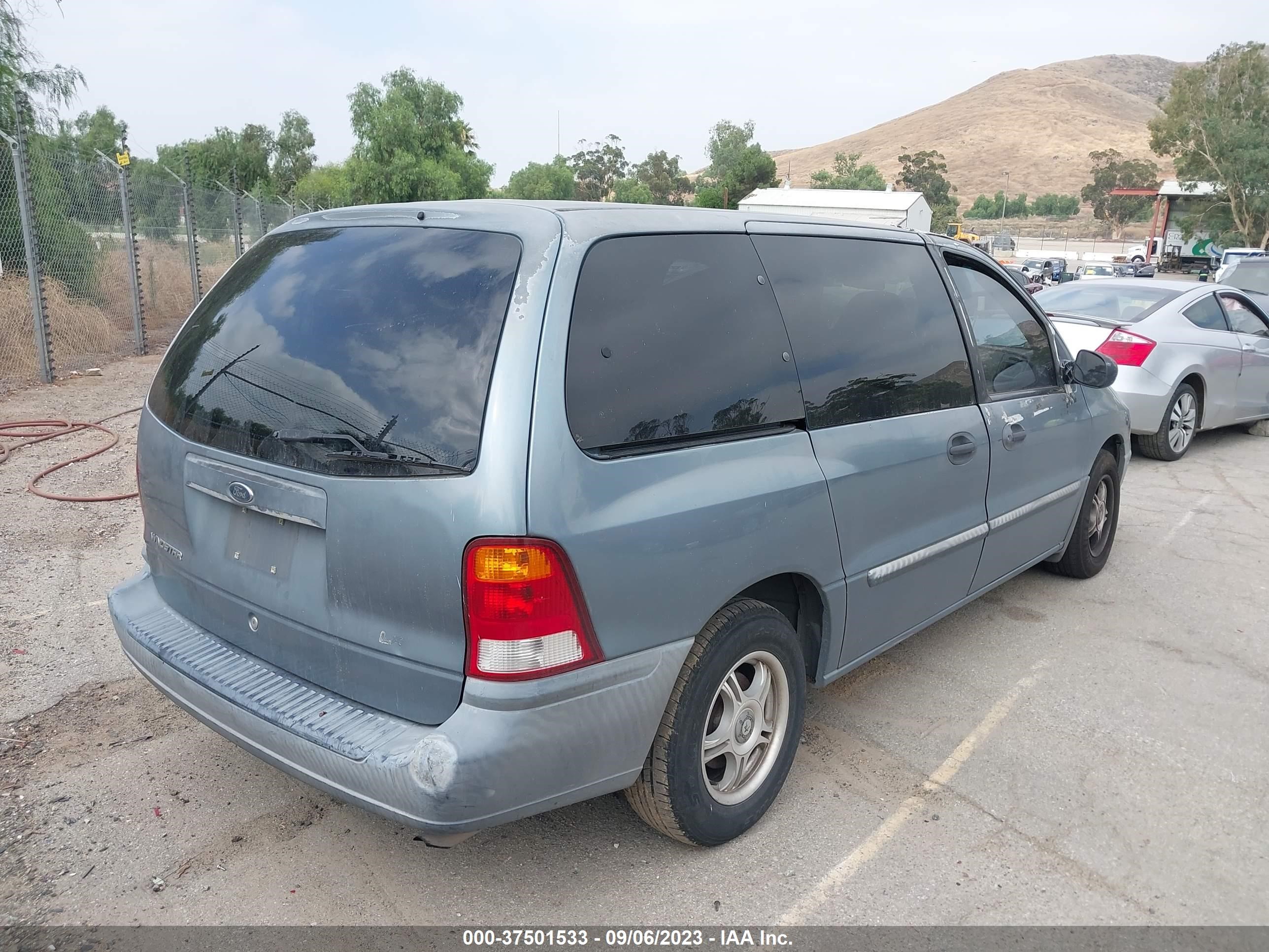 Photo 3 VIN: 2FMZA5142XBC00045 - FORD WINDSTAR 