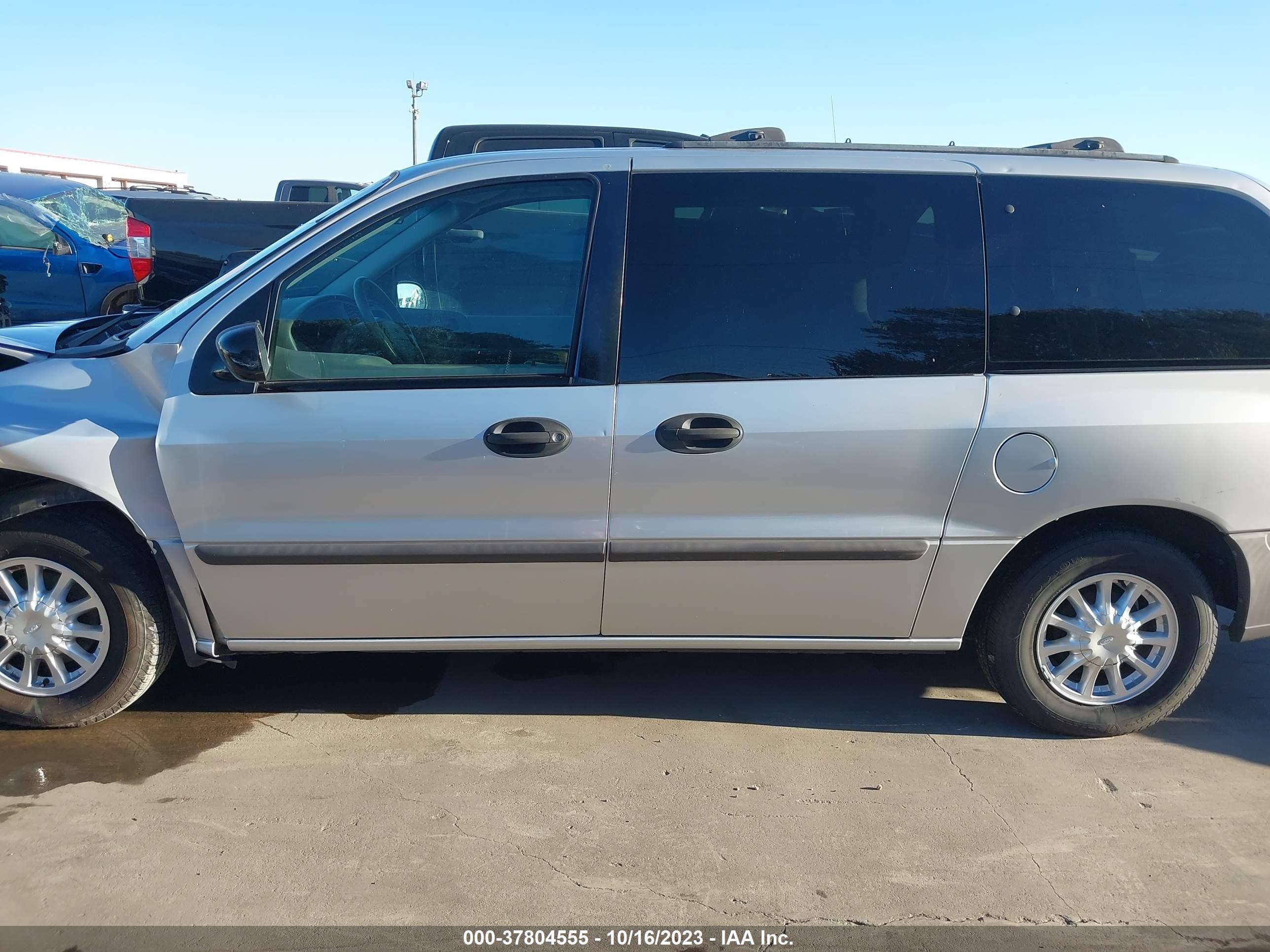 Photo 13 VIN: 2FMZA5147YBA11375 - FORD WINDSTAR 