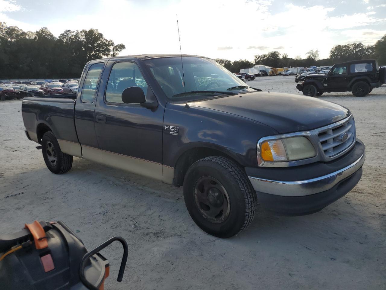 Photo 4 VIN: 2FTRX17W4XCA88976 - FORD F150 