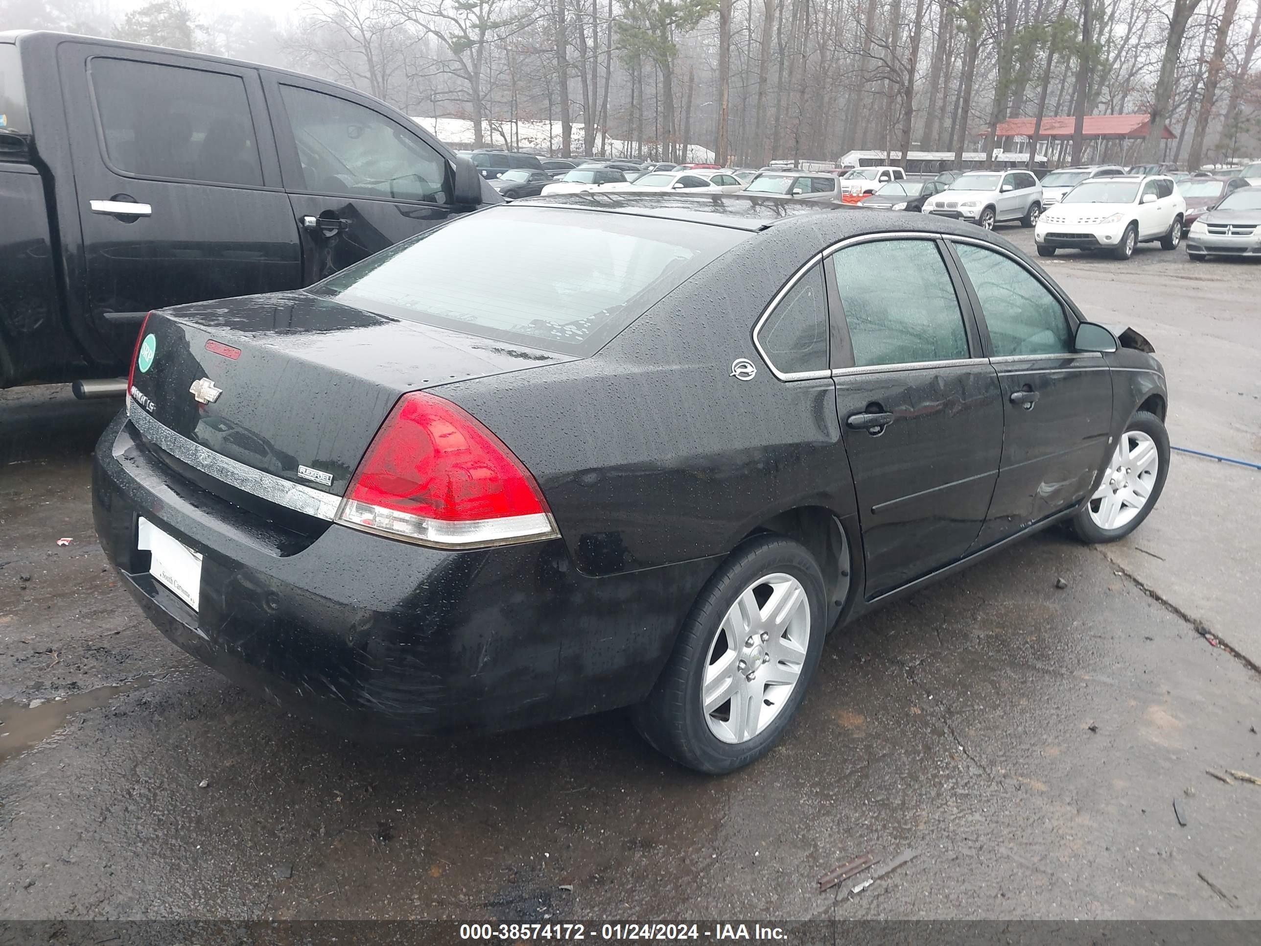 Photo 3 VIN: 2G1WB55K179385573 - CHEVROLET IMPALA 