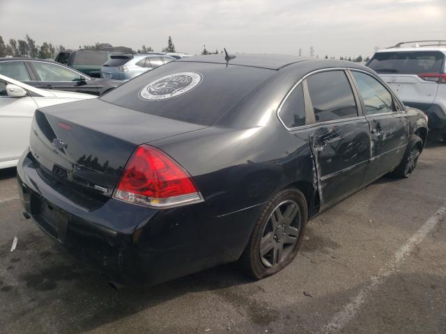 Photo 3 VIN: 2G1WB5E35E1113435 - CHEVROLET IMPALA LIM 