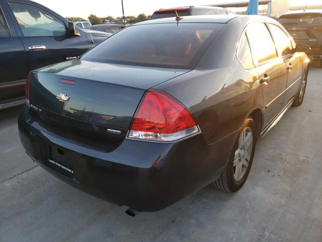 Photo 3 VIN: 2G1WB5E3XE1147323 - CHEVROLET IMPALA LIM 