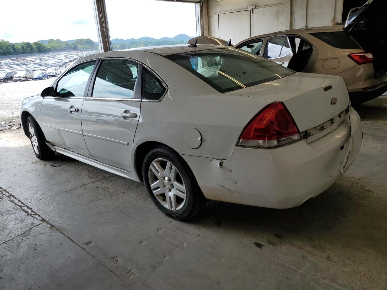 Photo 1 VIN: 2G1WB5E3XE1169676 - CHEVROLET IMPALA 