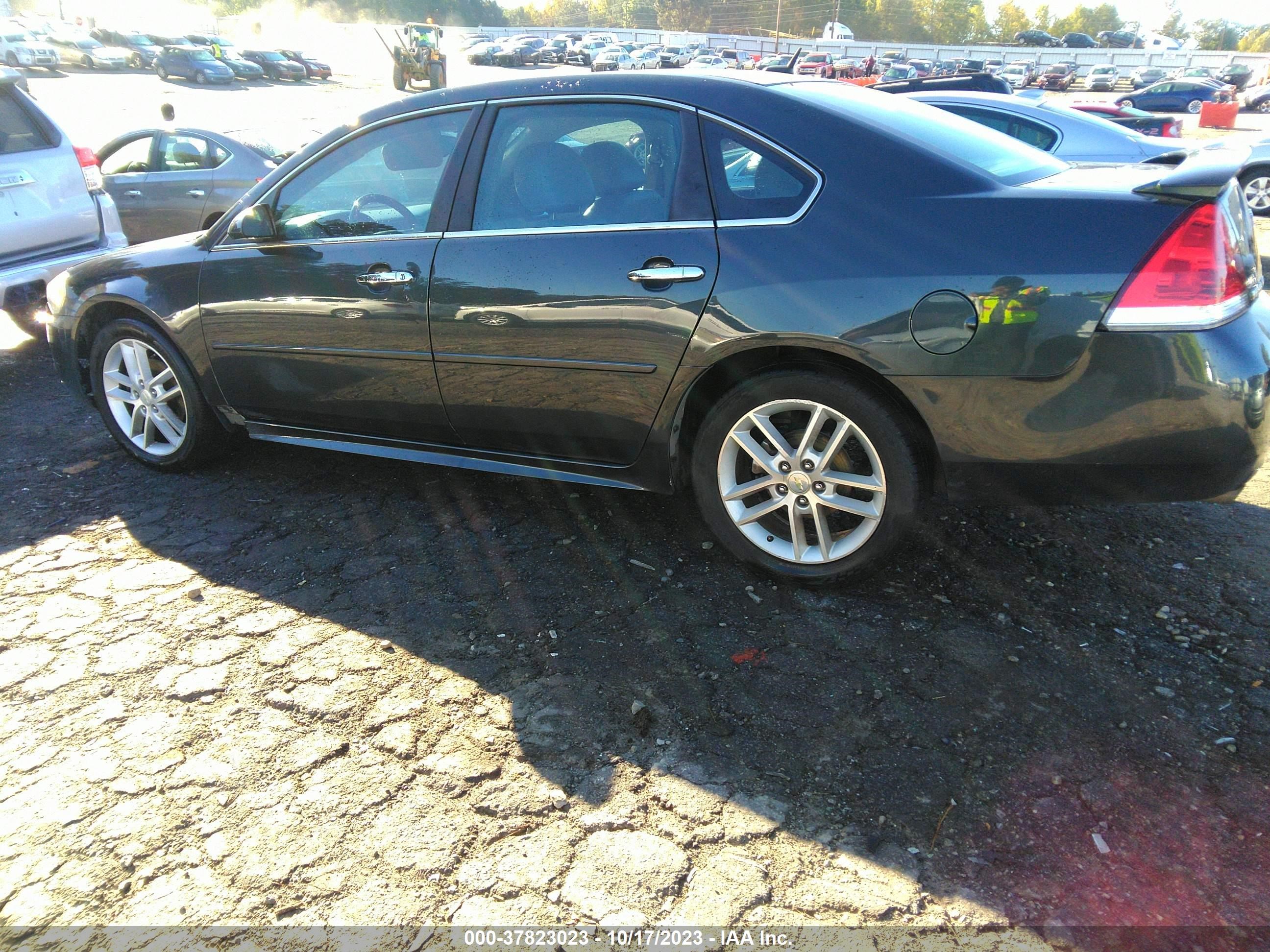 Photo 13 VIN: 2G1WC5E32D1209115 - CHEVROLET IMPALA 