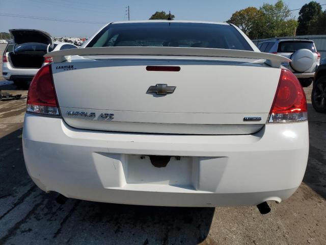 Photo 5 VIN: 2G1WC5E34E1112600 - CHEVROLET IMPALA LIM 