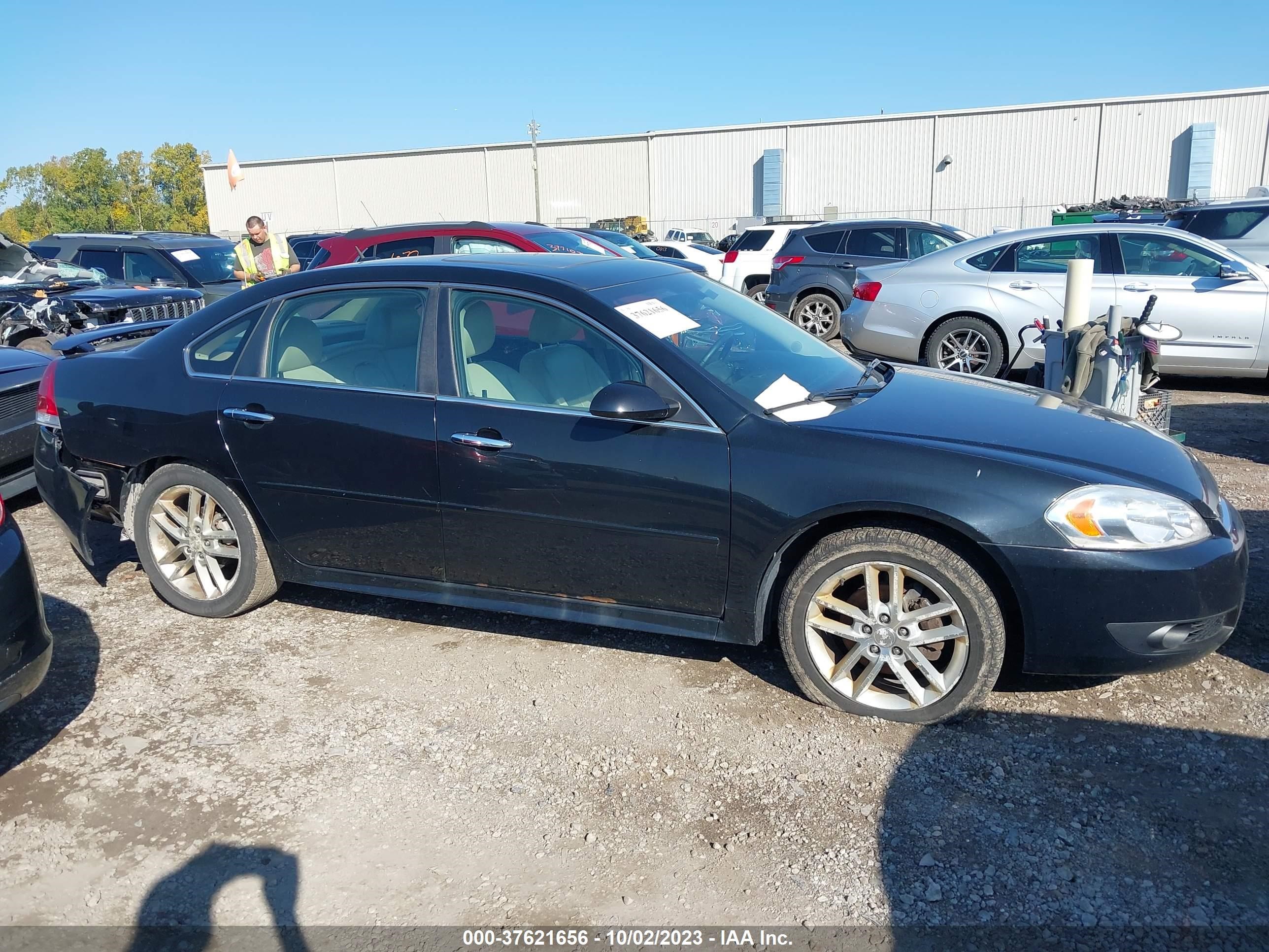 Photo 12 VIN: 2G1WC5E37C1205432 - CHEVROLET IMPALA 