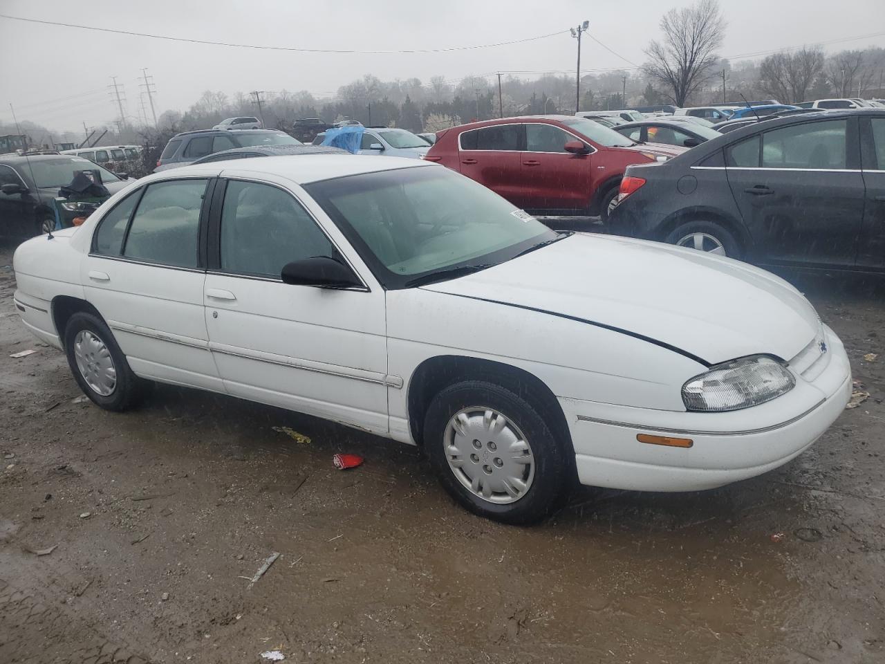 Photo 3 VIN: 2G1WL52J5Y1162574 - CHEVROLET LUMINA 