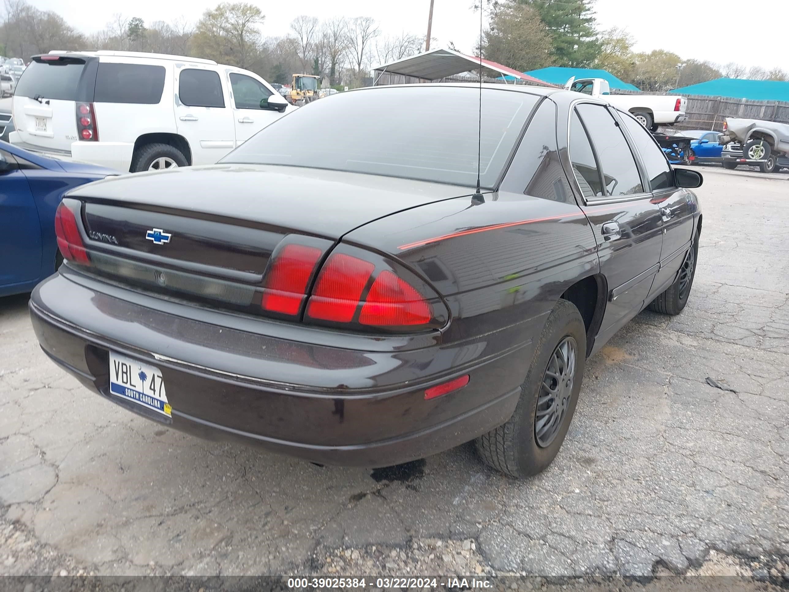 Photo 3 VIN: 2G1WL52J7Y1303967 - CHEVROLET LUMINA 