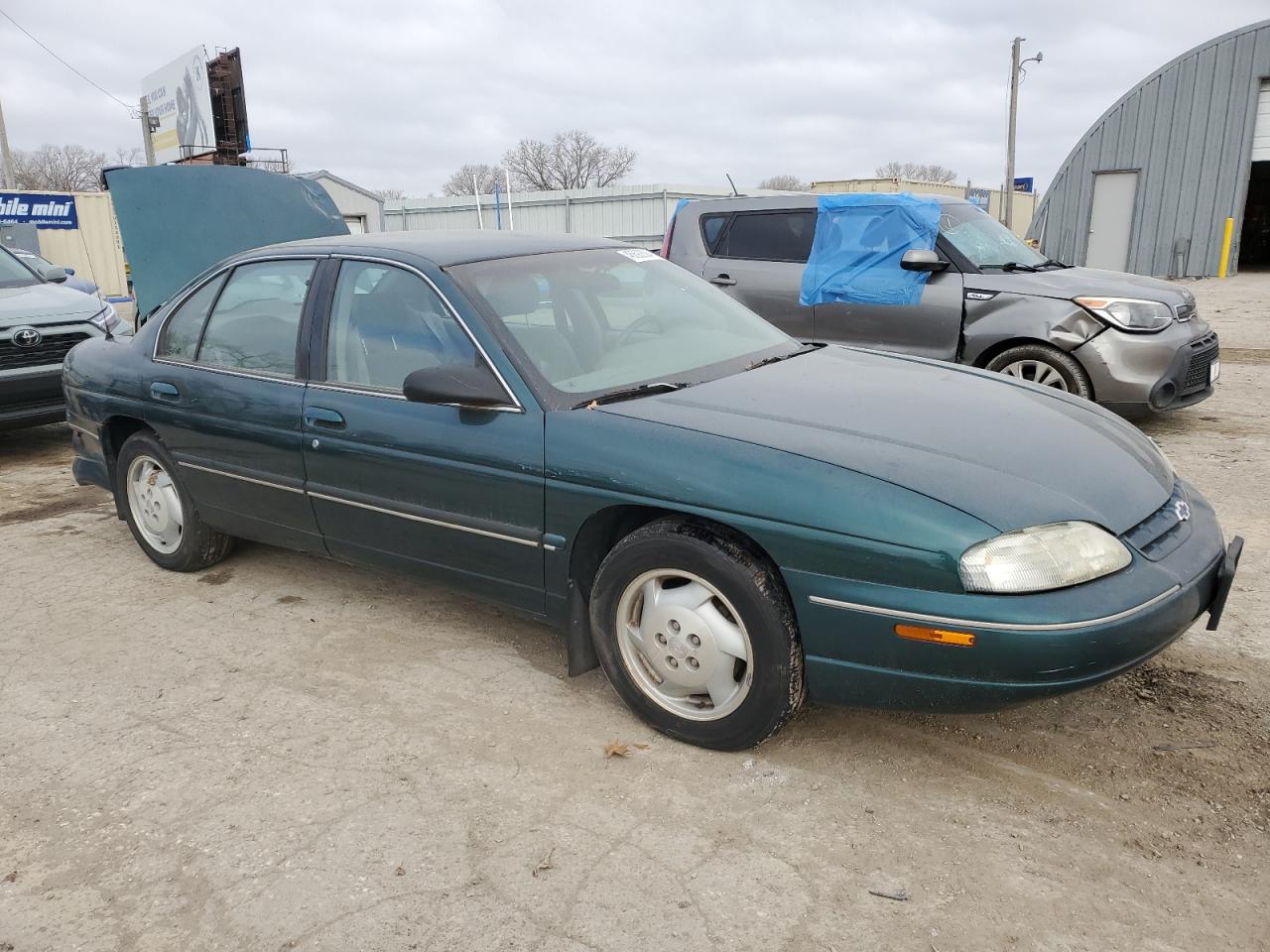 Photo 3 VIN: 2G1WL52M0V9138027 - CHEVROLET LUMINA 