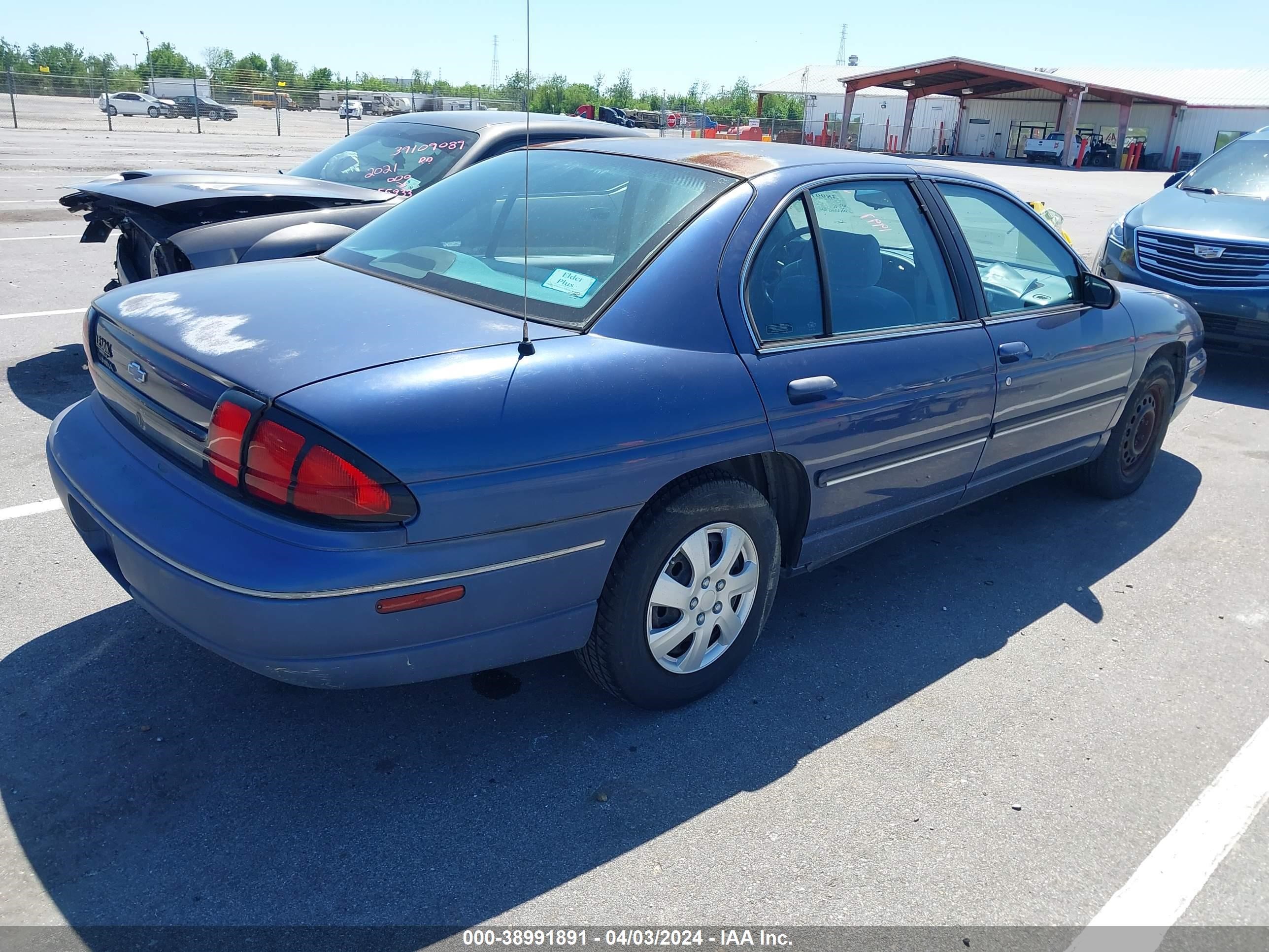 Photo 3 VIN: 2G1WL52M0V9147648 - CHEVROLET LUMINA 