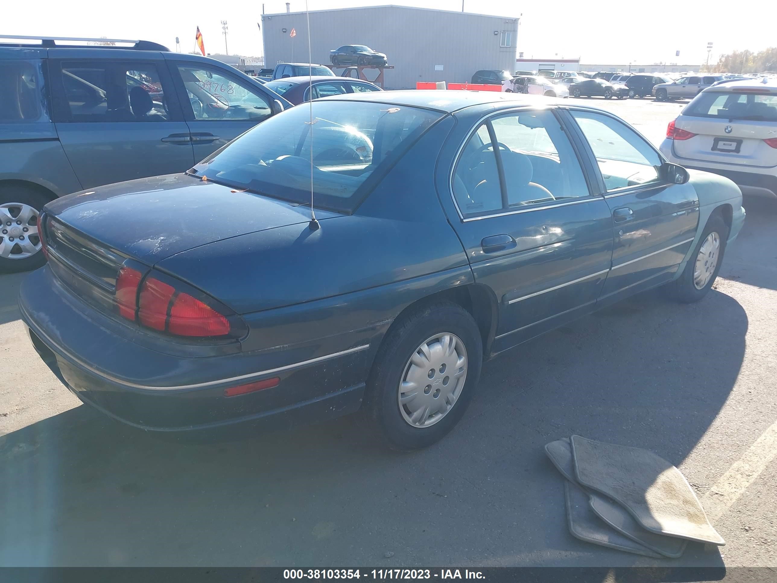 Photo 3 VIN: 2G1WL52M1T9216554 - CHEVROLET LUMINA 