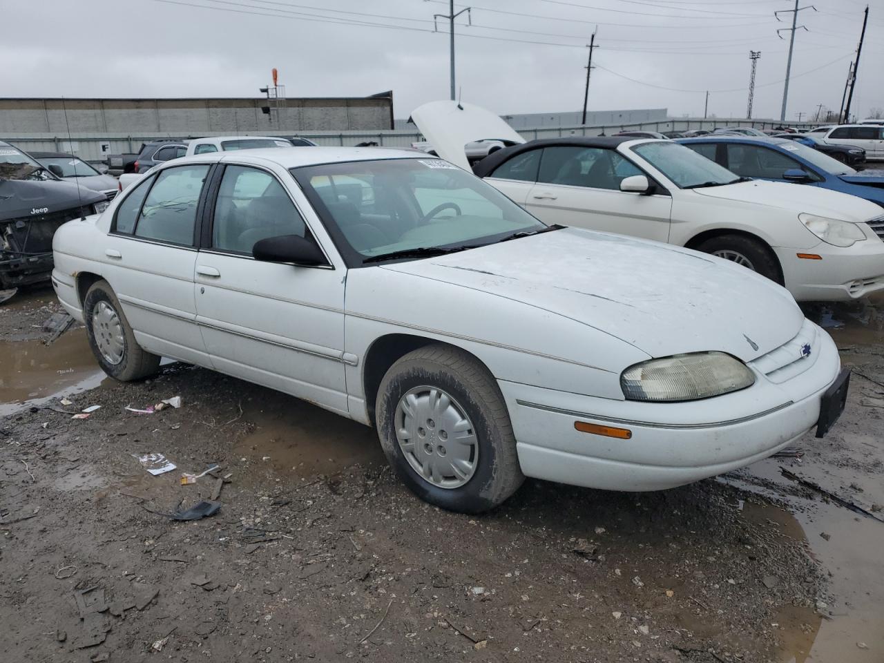 Photo 3 VIN: 2G1WL52M1V9109779 - CHEVROLET LUMINA 