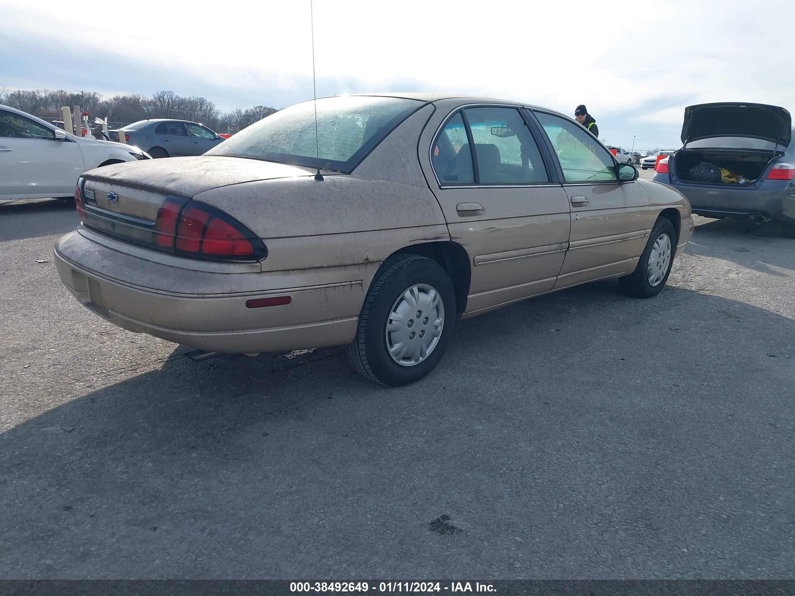 Photo 3 VIN: 2G1WL52M3W9242075 - CHEVROLET LUMINA 