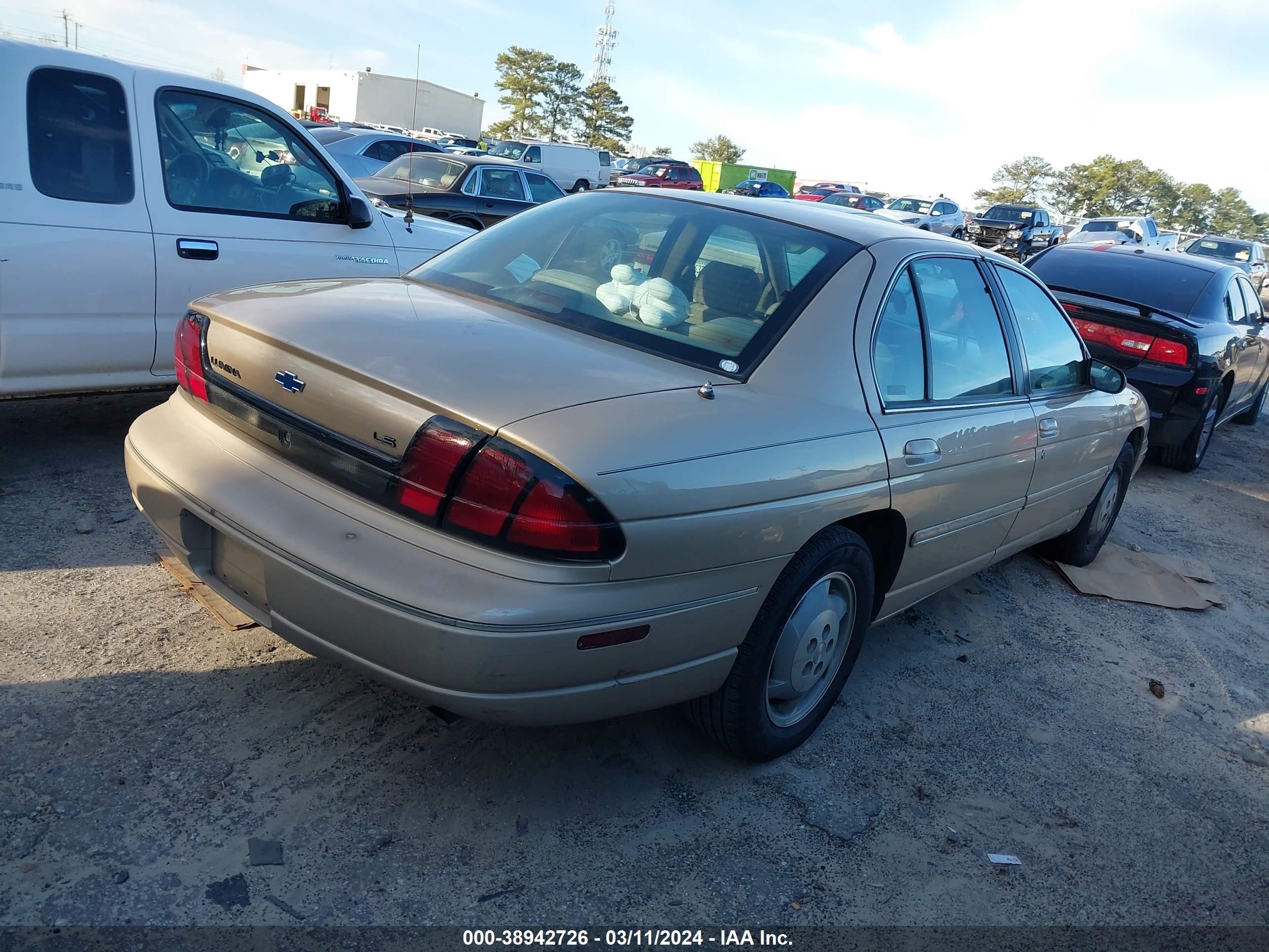 Photo 3 VIN: 2G1WL52M5X9246355 - CHEVROLET LUMINA 