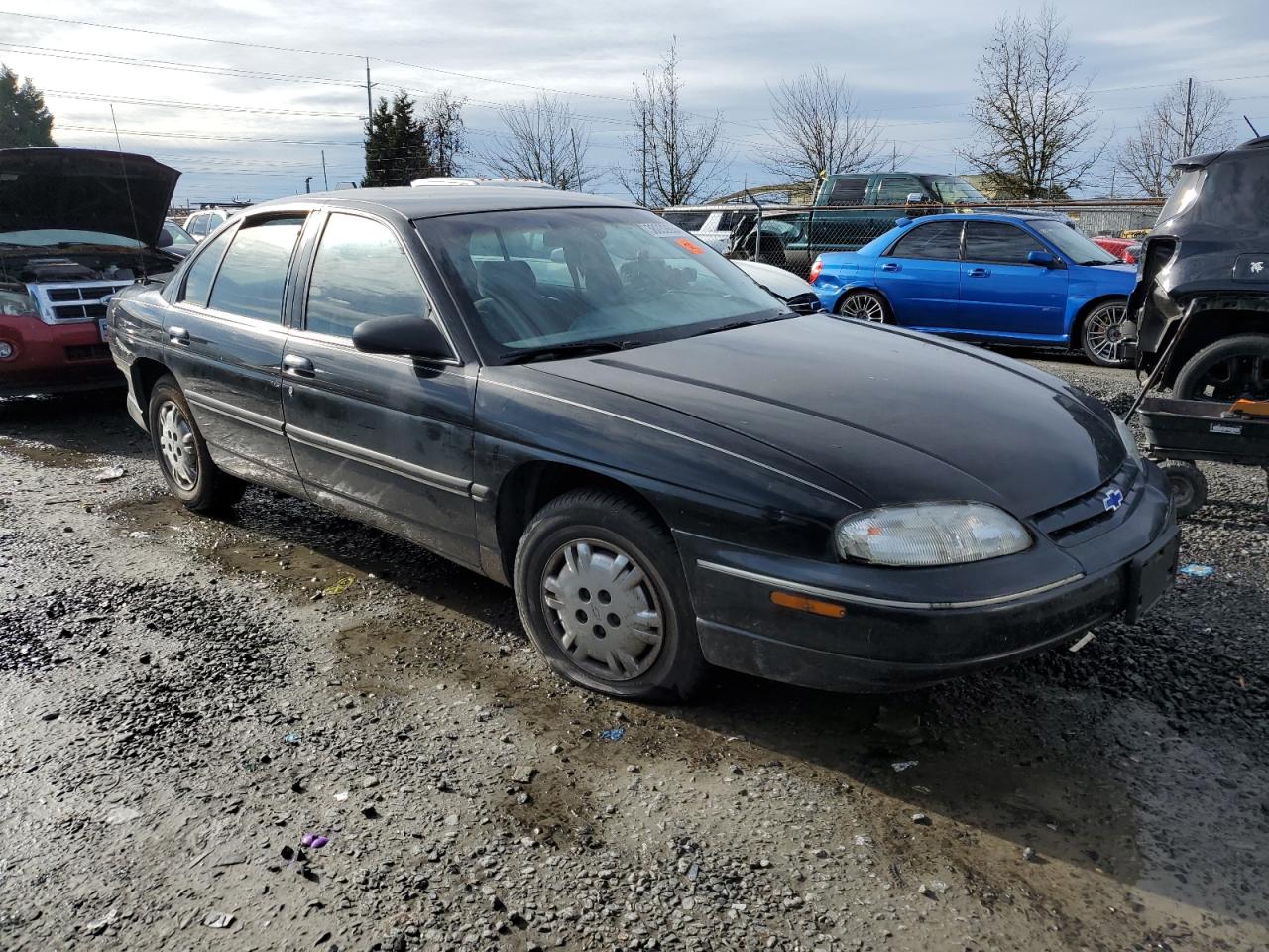 Photo 3 VIN: 2G1WL52M6S1112347 - CHEVROLET LUMINA 