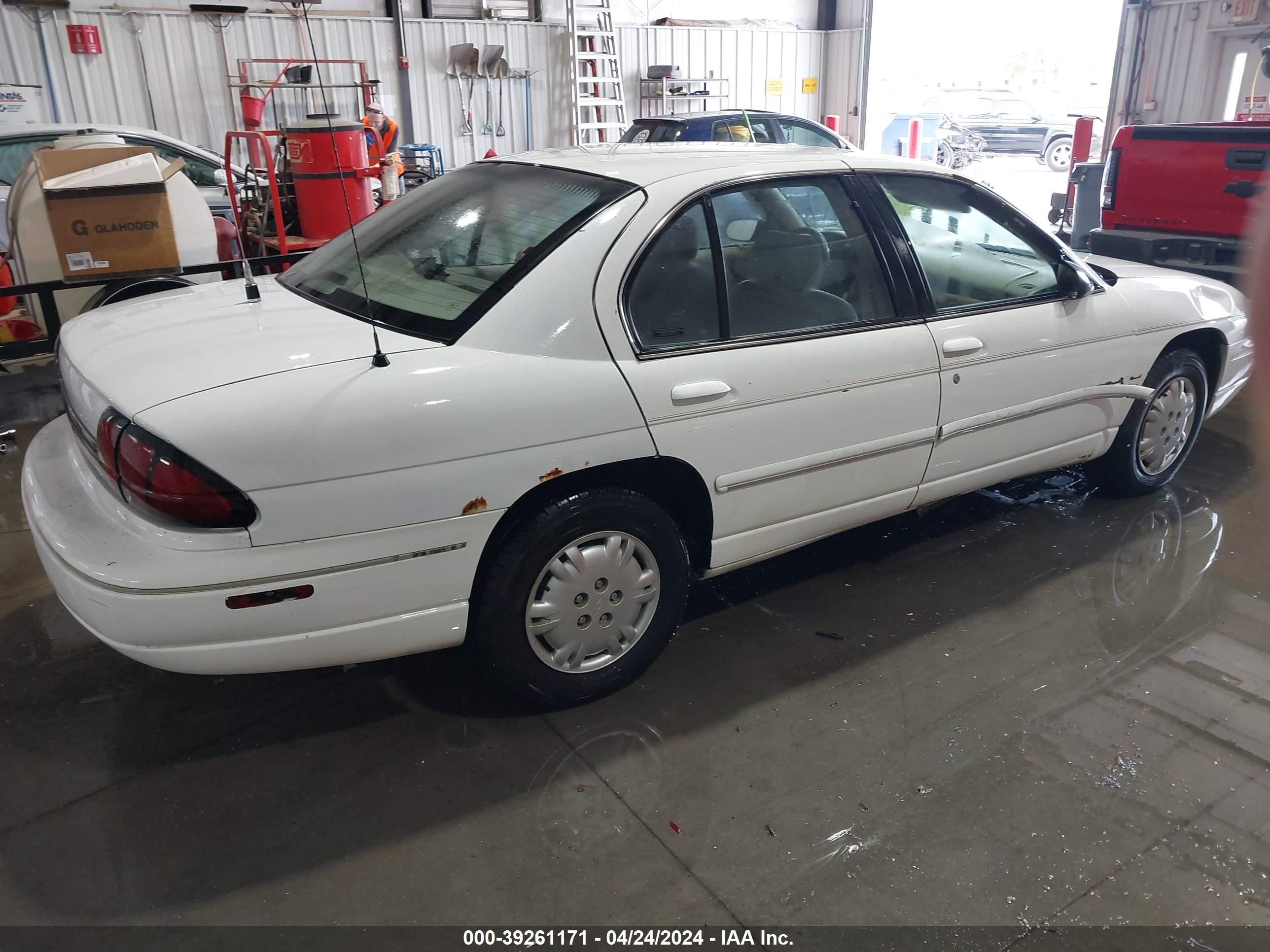 Photo 3 VIN: 2G1WL52M8X9279205 - CHEVROLET LUMINA 