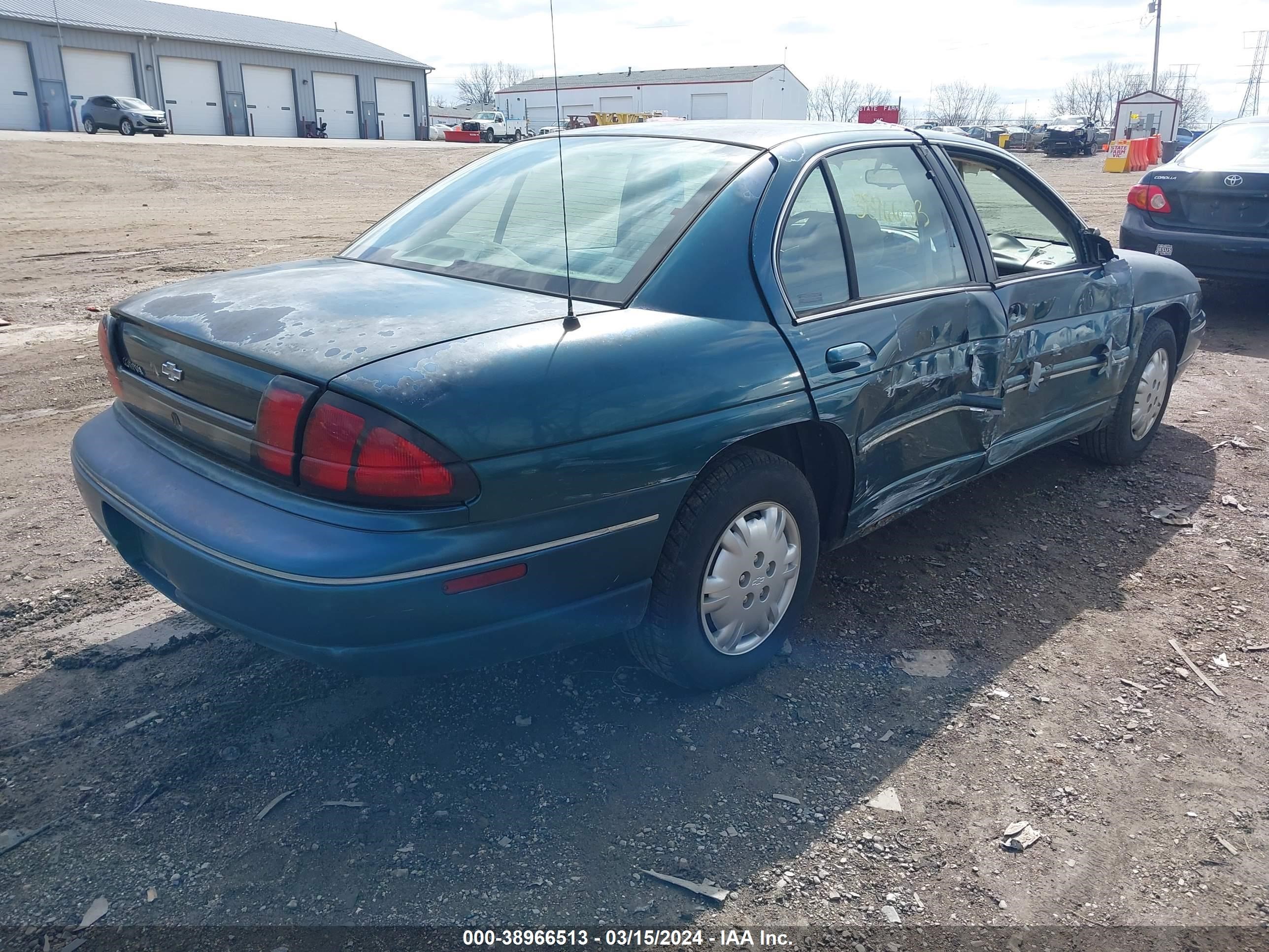 Photo 3 VIN: 2G1WL52M9V9174105 - CHEVROLET LUMINA 