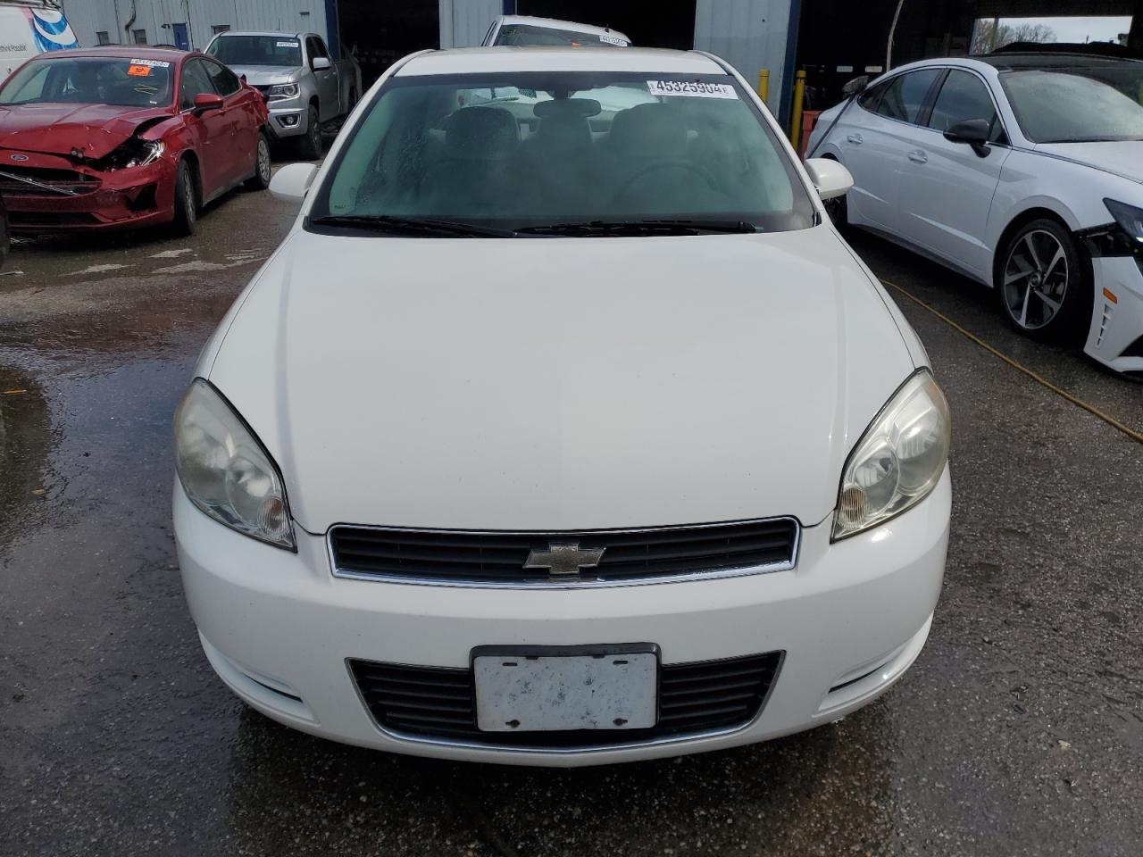 Photo 4 VIN: 2G1WT57K691122040 - CHEVROLET IMPALA 