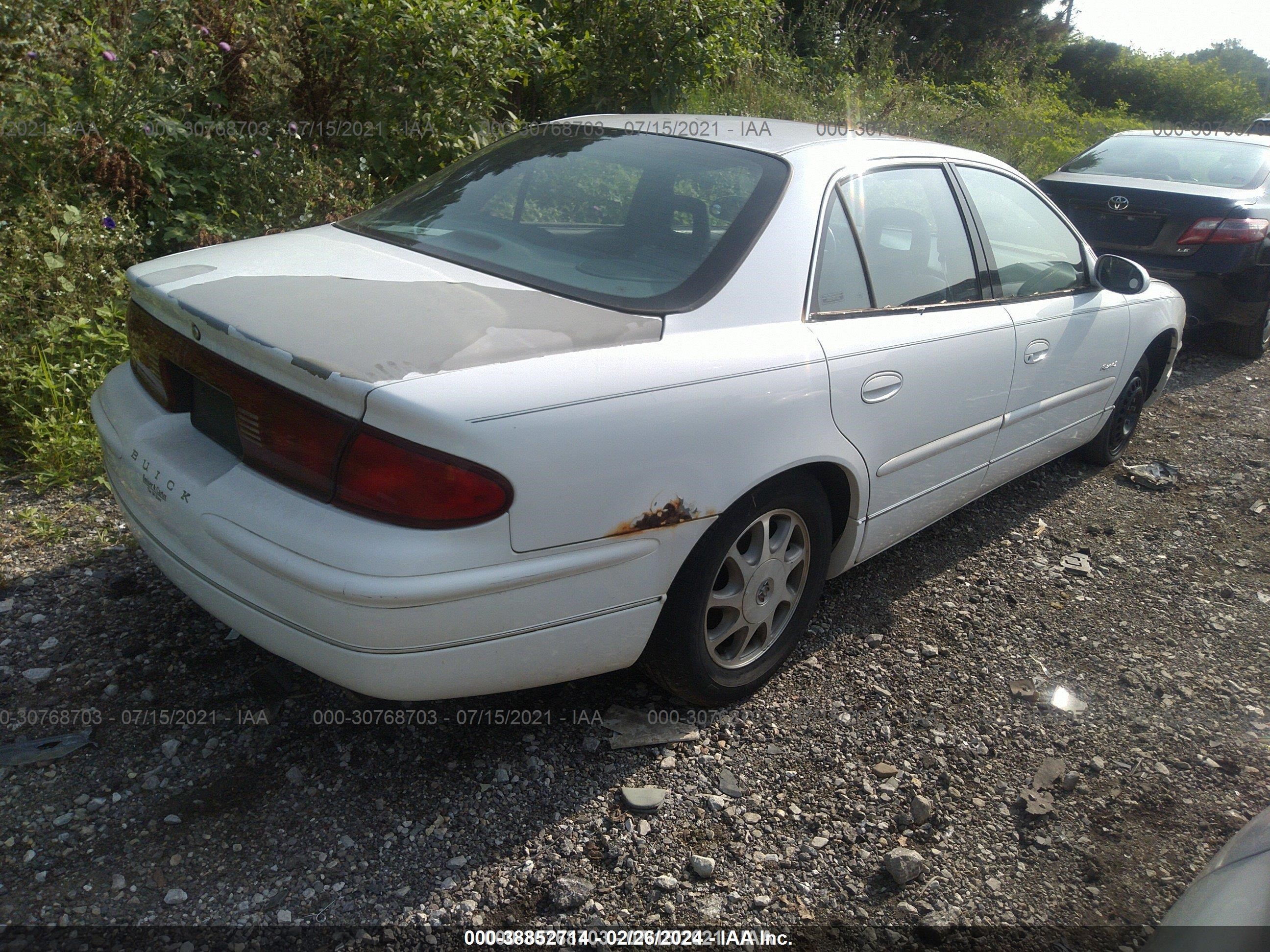 Photo 4 VIN: 2G4WB52K1W1413912 - BUICK REGAL 