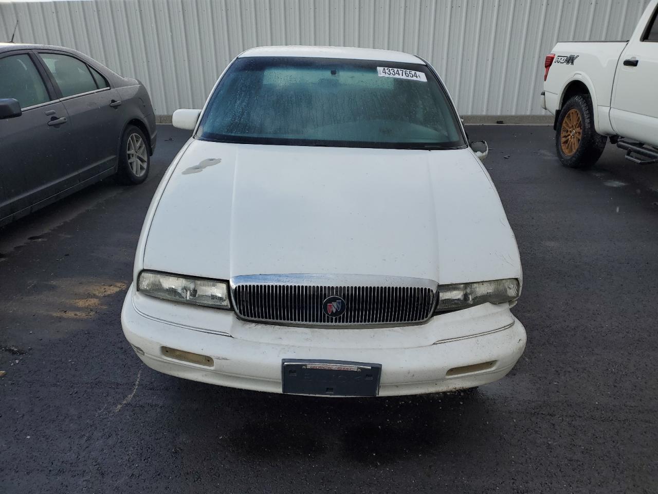 Photo 4 VIN: 2G4WB52L8S1480347 - BUICK REGAL 