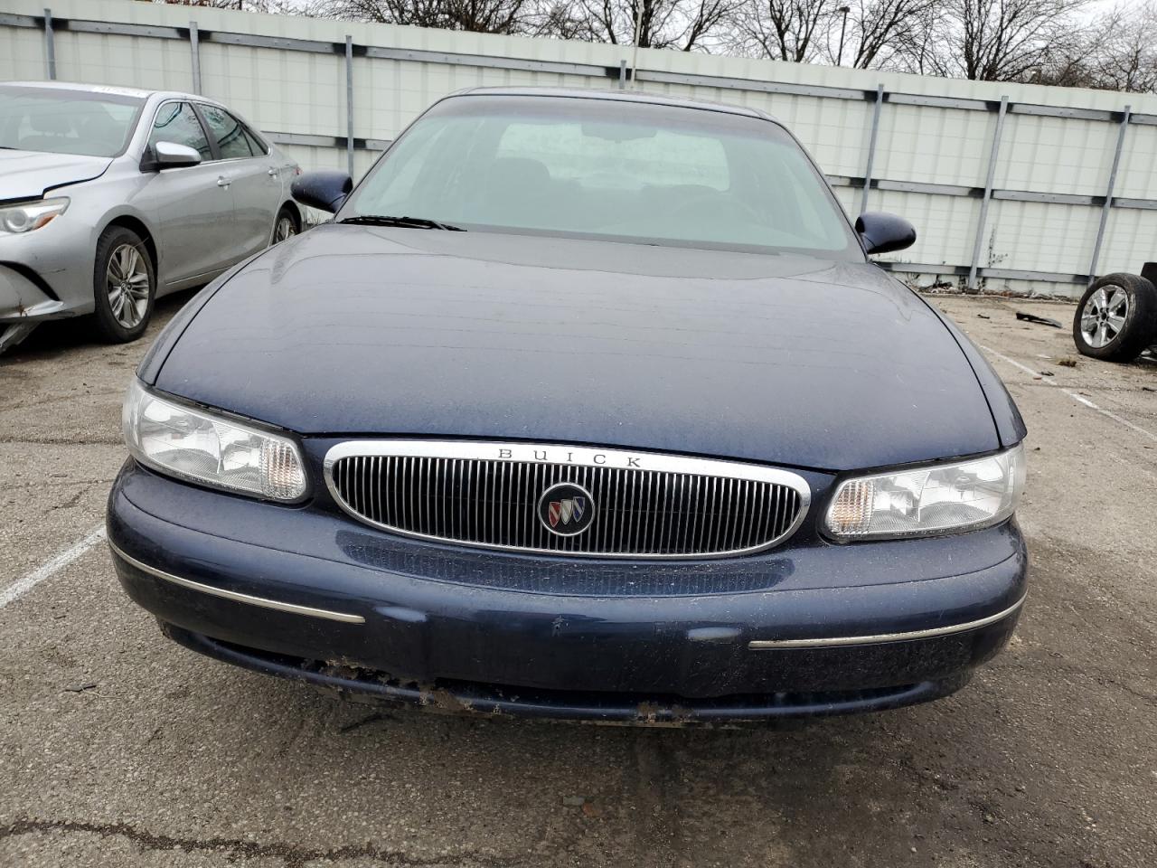 Photo 4 VIN: 2G4WS52J8Y1293911 - BUICK CENTURY 