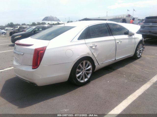 Photo 3 VIN: 2G61P5S33D9145553 - CADILLAC XTS 