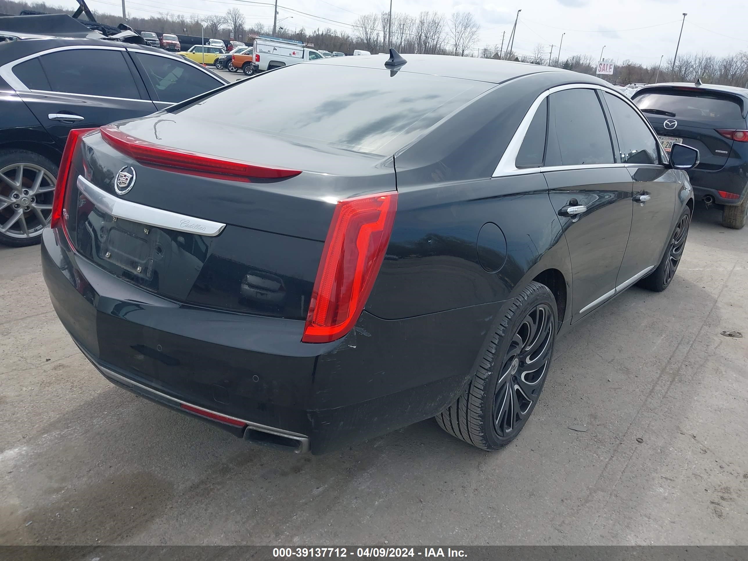 Photo 3 VIN: 2G61P5S35D9132352 - CADILLAC XTS 