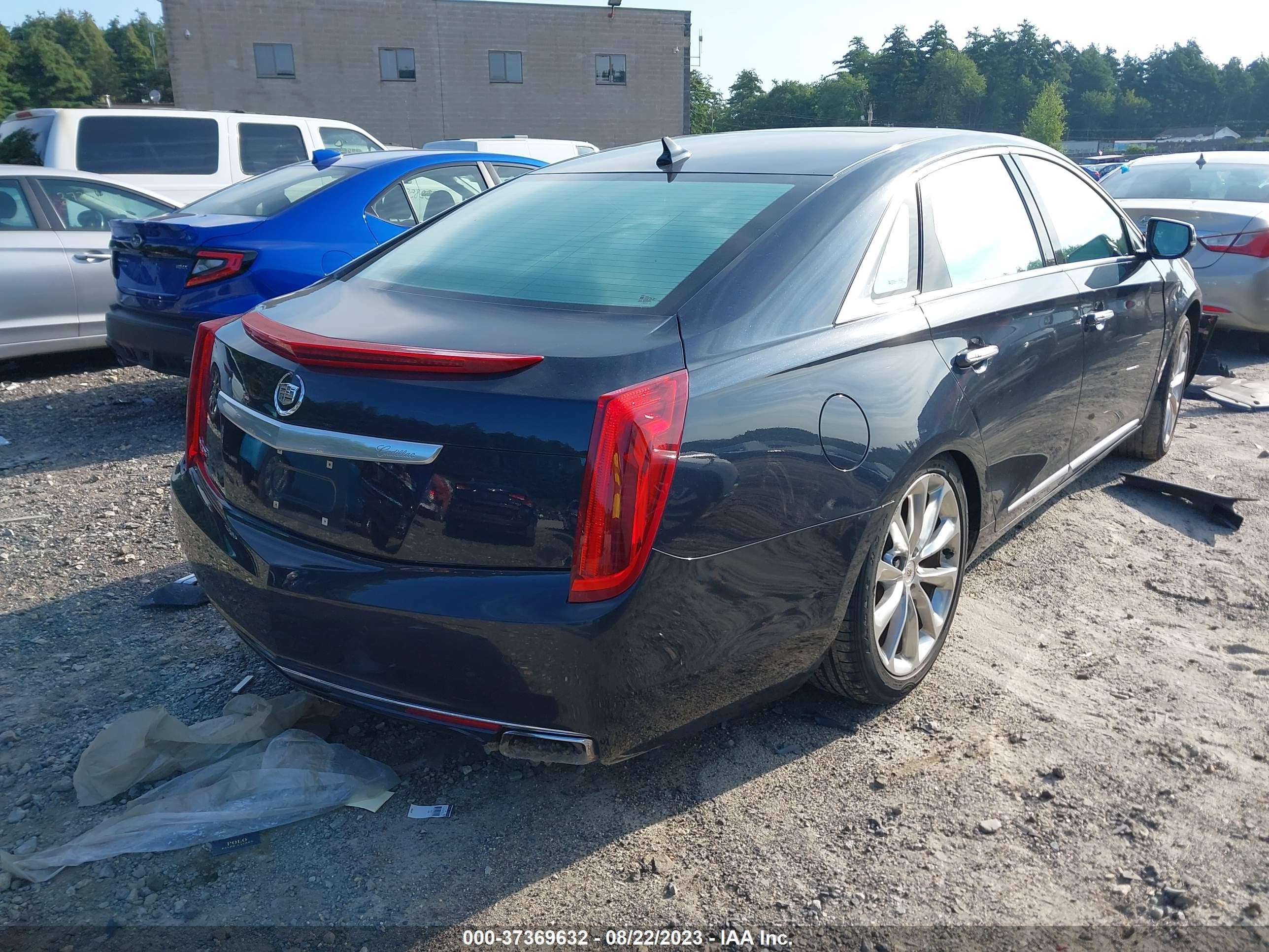 Photo 3 VIN: 2G61P5S36D9167658 - CADILLAC XTS 