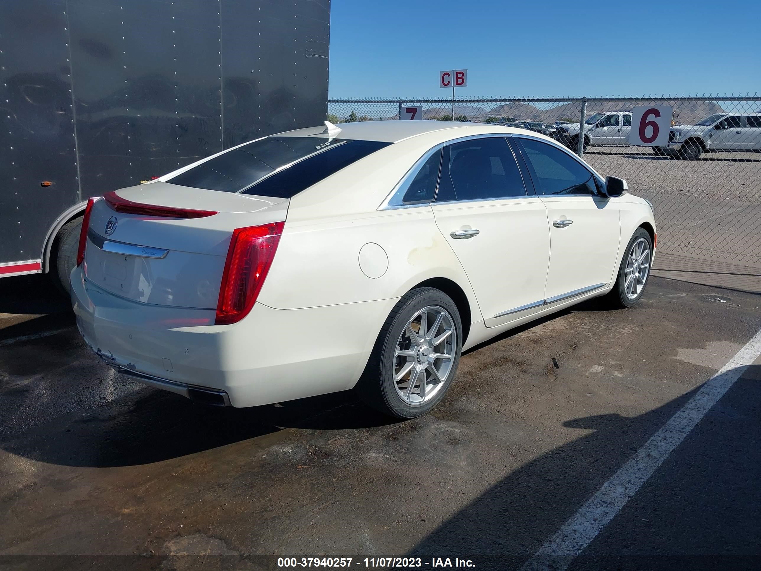 Photo 3 VIN: 2G61P5S39D9103758 - CADILLAC XTS 