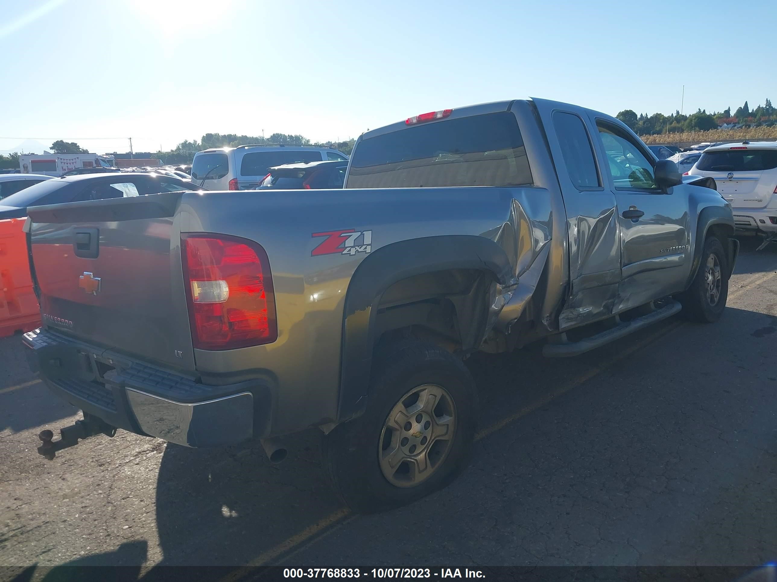 Photo 3 VIN: 2GCEK19J571663788 - CHEVROLET SILVERADO 