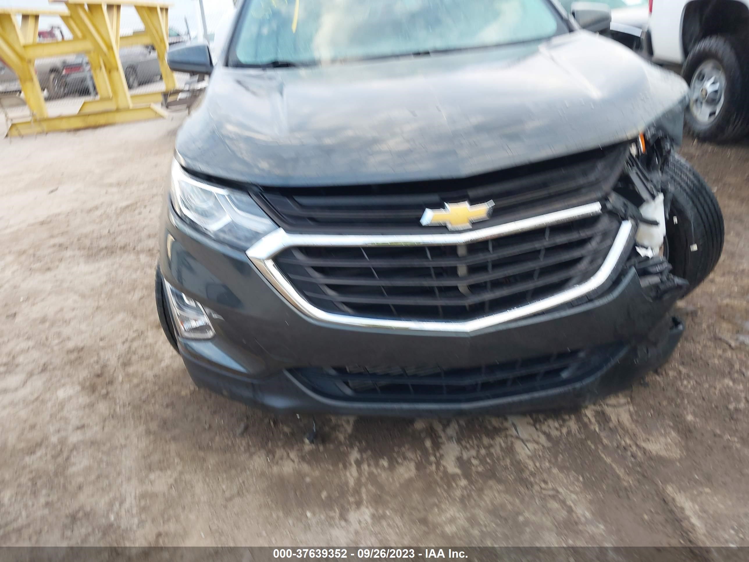 Photo 11 VIN: 2GNAXJEV0J6258707 - CHEVROLET EQUINOX 