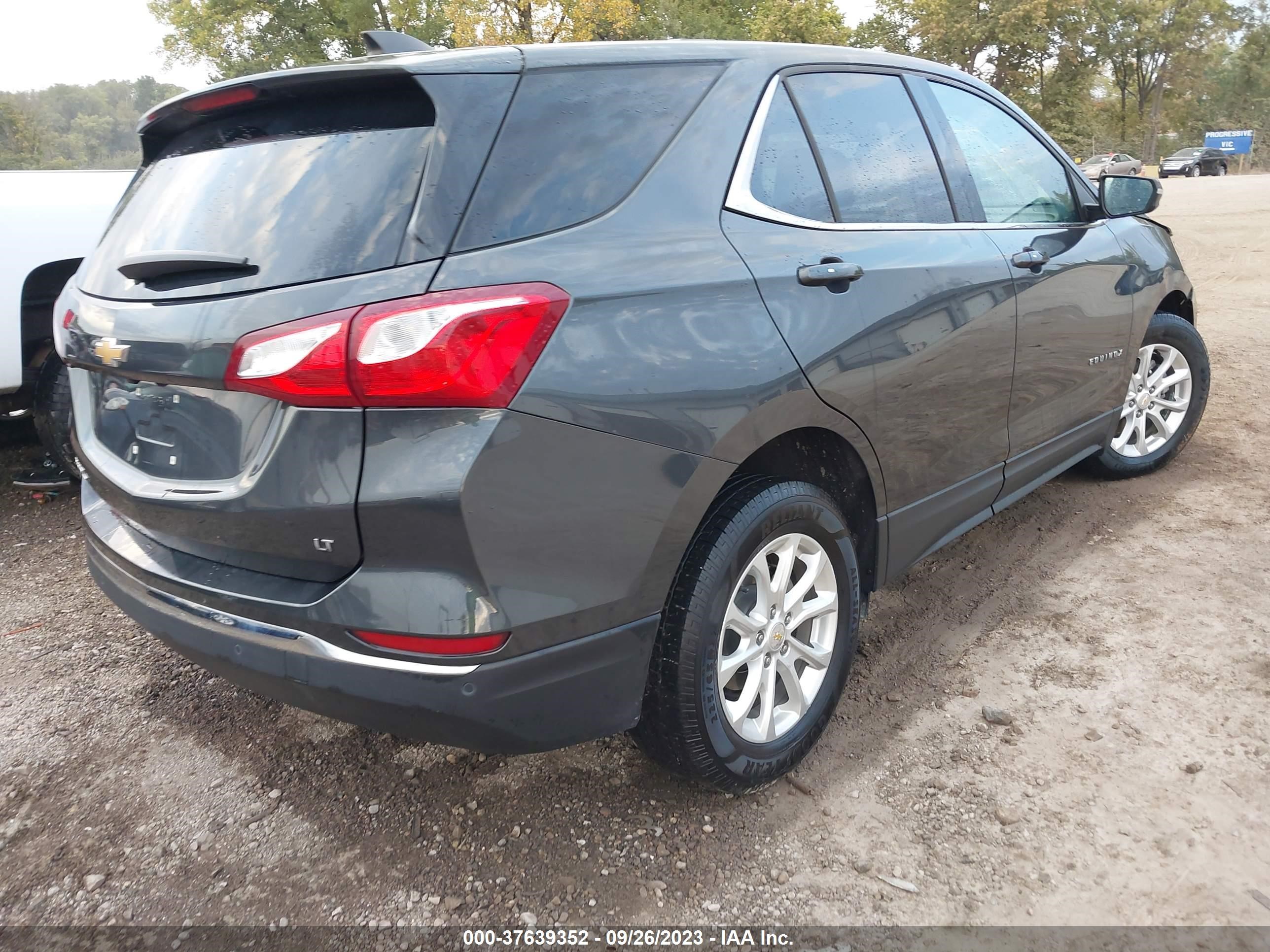 Photo 3 VIN: 2GNAXJEV0J6258707 - CHEVROLET EQUINOX 