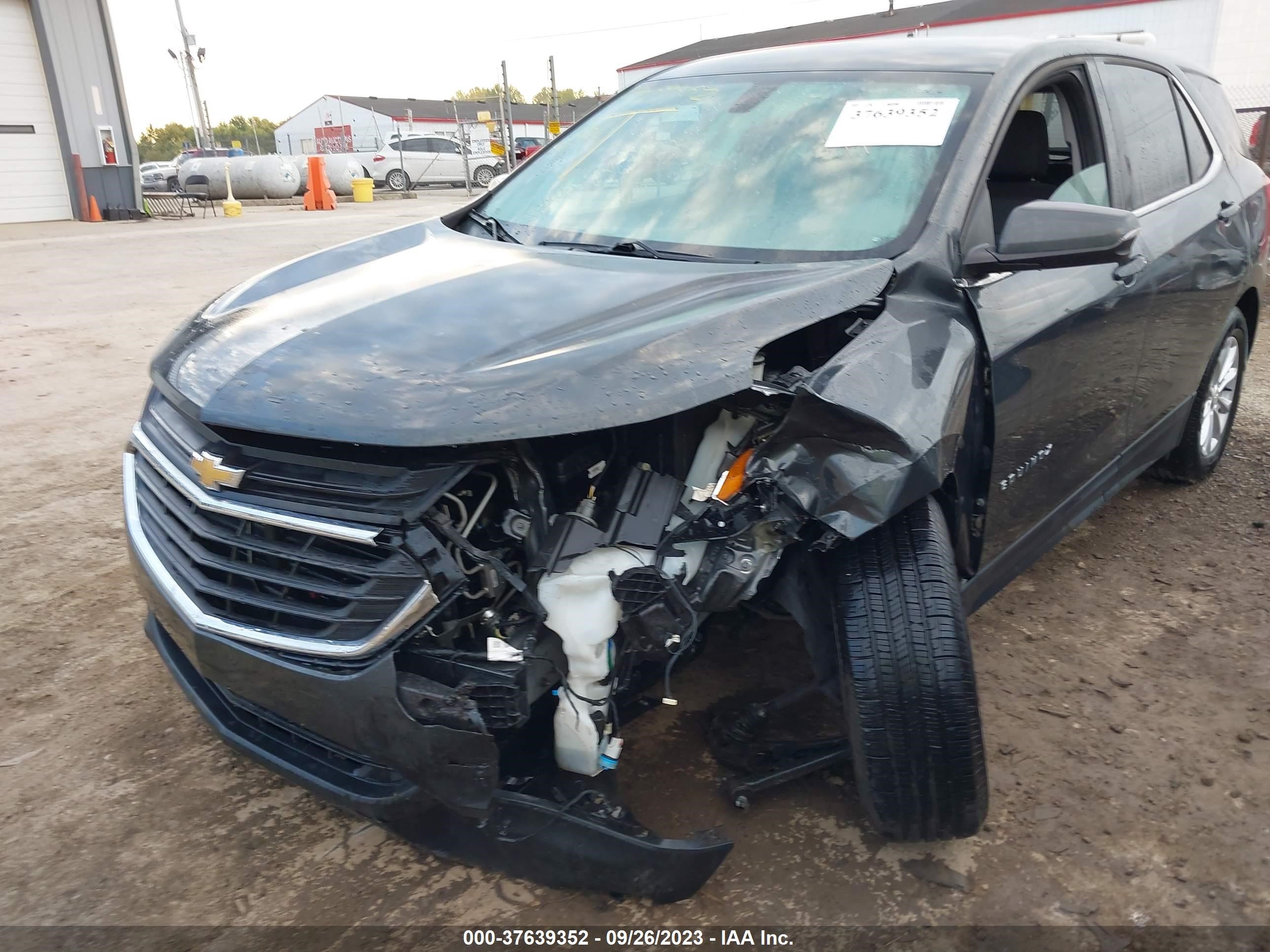 Photo 5 VIN: 2GNAXJEV0J6258707 - CHEVROLET EQUINOX 