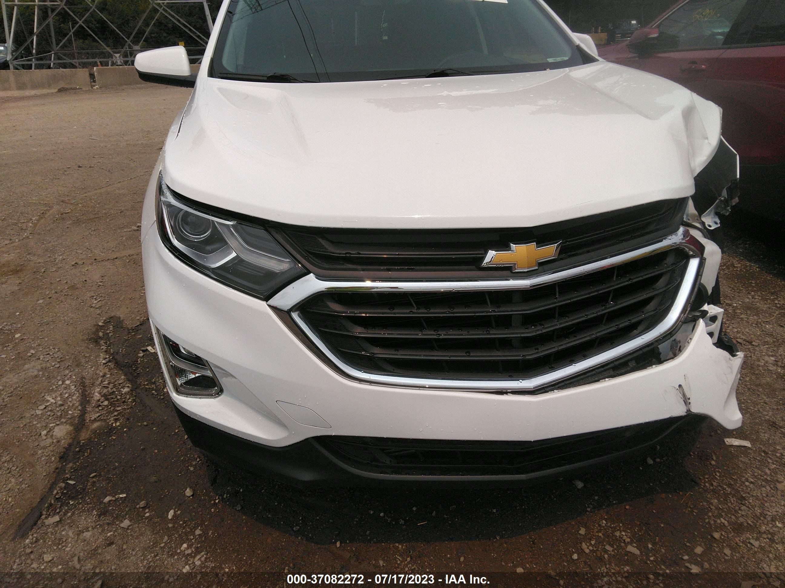 Photo 11 VIN: 2GNAXJEV0J6278374 - CHEVROLET EQUINOX 