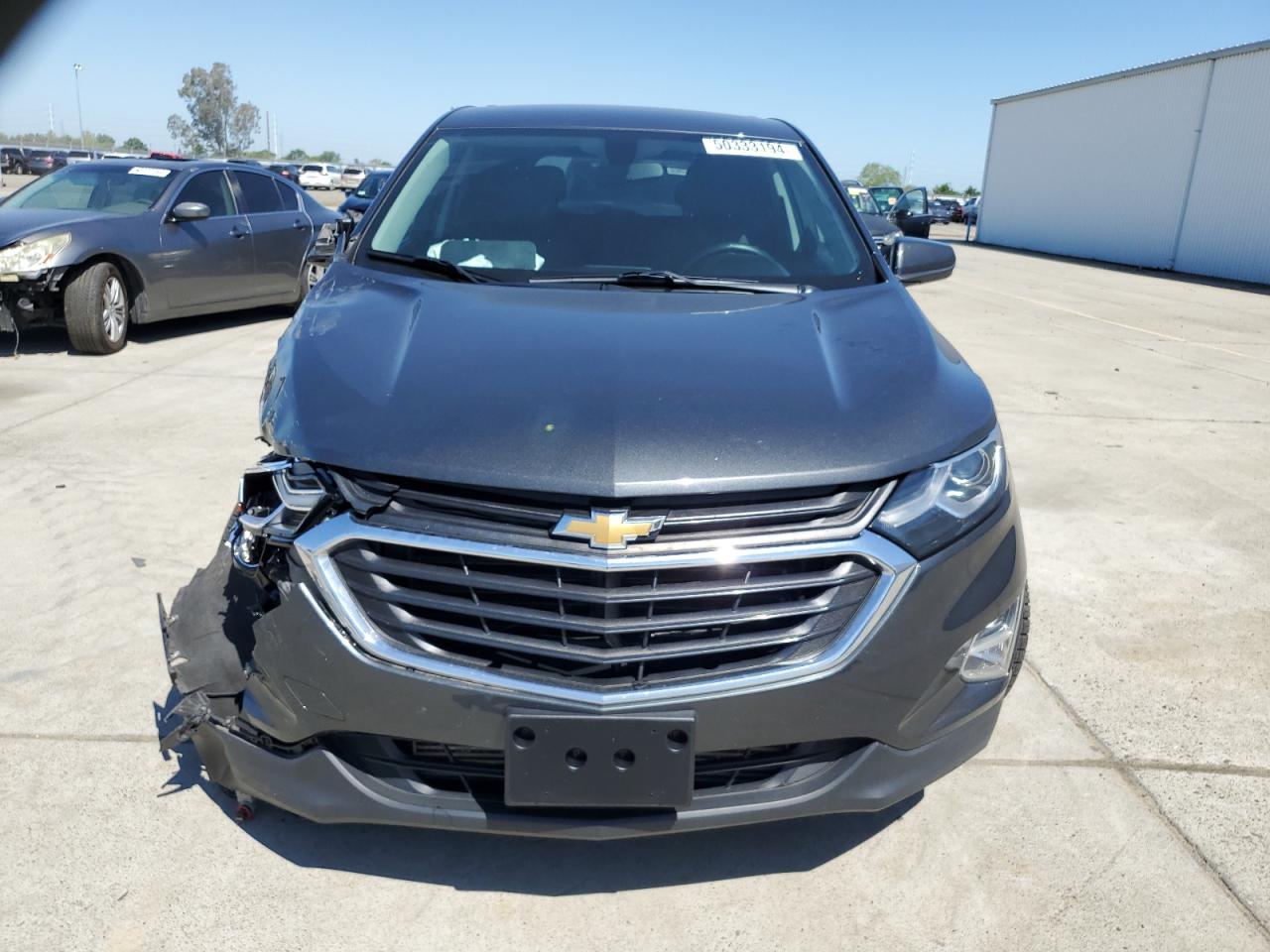 Photo 4 VIN: 2GNAXJEV6J6294384 - CHEVROLET EQUINOX 