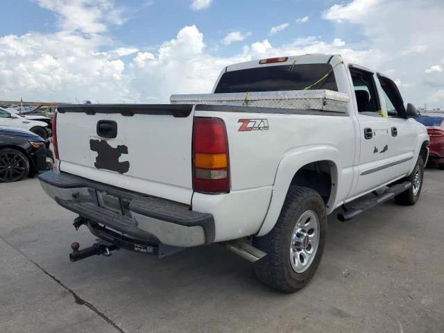 Photo 2 VIN: 2GTEK13Z771182889 - GMC NEW SIERRA 