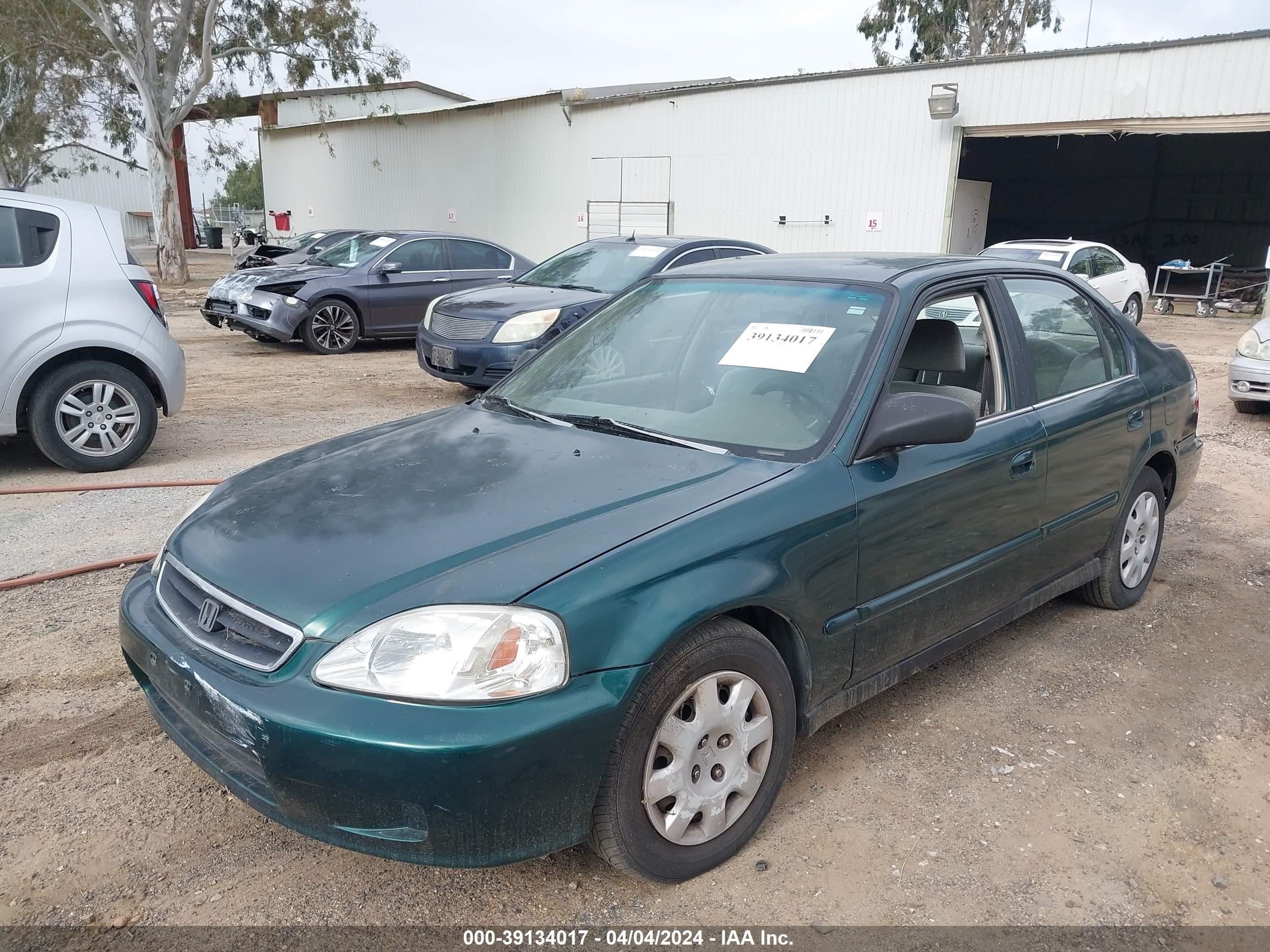 Photo 1 VIN: 2HGEJ6610XH530093 - HONDA CIVIC 